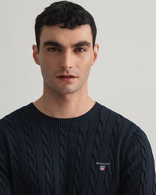 Gant tummansininen palmikko neule