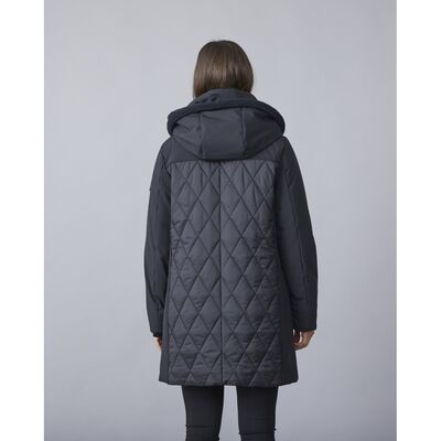 Junge musta tikattu toppatakki