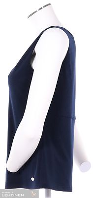 Tian ryhdikäs, joustavasta materiaalista valmistettu toppi v-pääntiellä