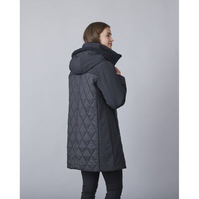 Junge musta tikattu toppatakki