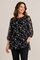 STI musta pliseerattu tunika kukkakuosilla