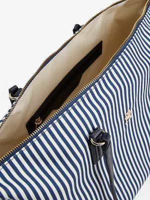 Tommy Hilfiger sinivalkoraidallinen kangaslaukku