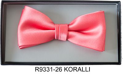 Matex korallin sävyinen rusetti ja taskuliina