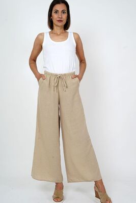 M.X.O leveälahkeiset beiget kesähousut