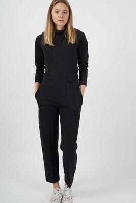 Tummanharmaat meleeratut housut kuminauha vyötäröllä