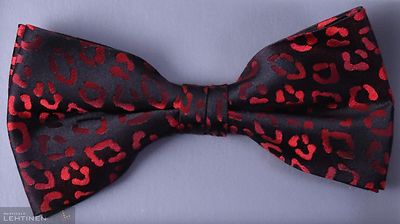 Matex musta rusetti punaisella kuviolla