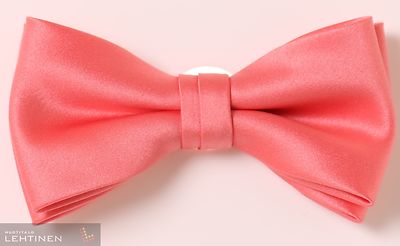 Matex korallin sävyinen rusetti ja taskuliina