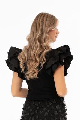 Capri Collection musta röyhelöhihainen toppi